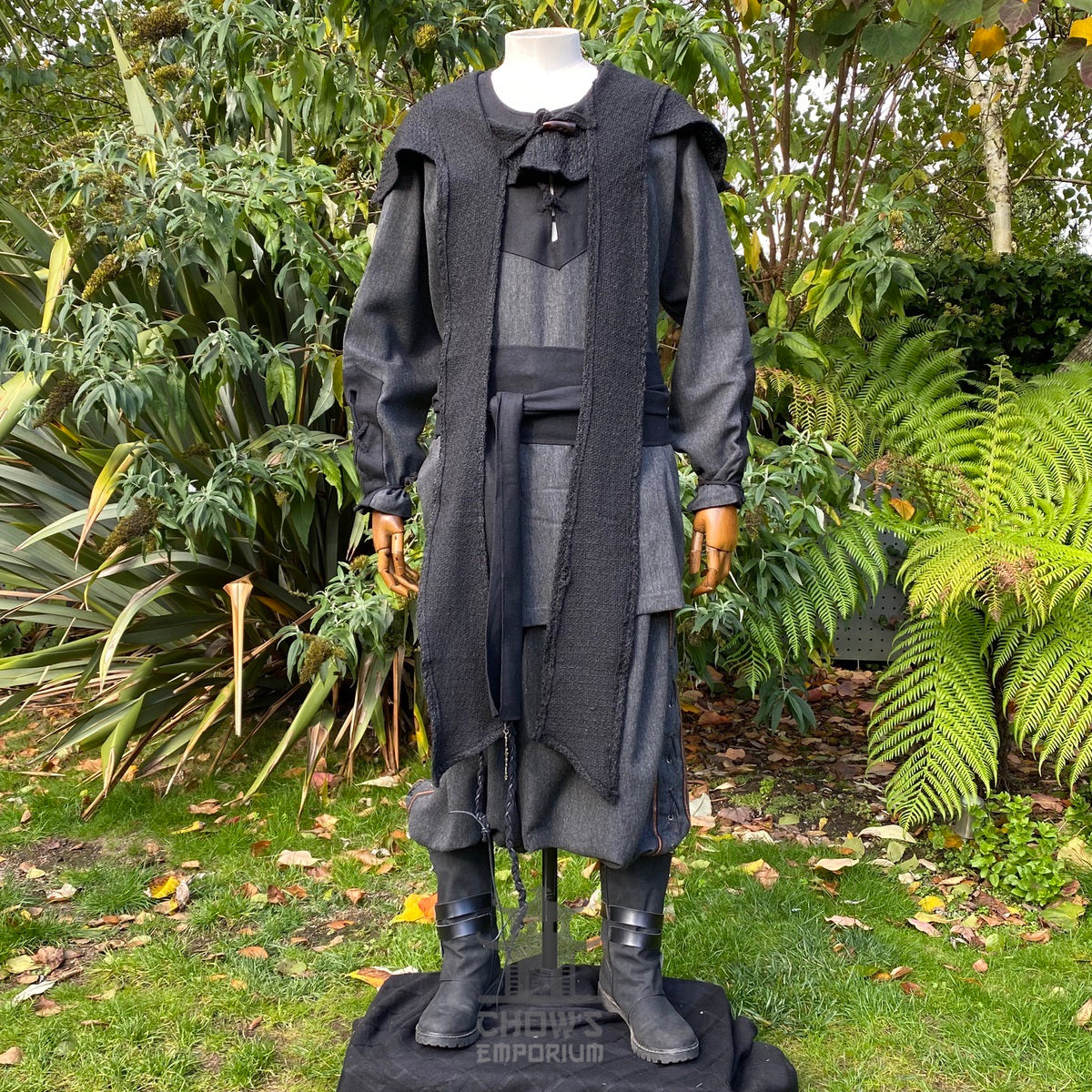Black wool scarf hood in medieval style, draped over a mannequin.