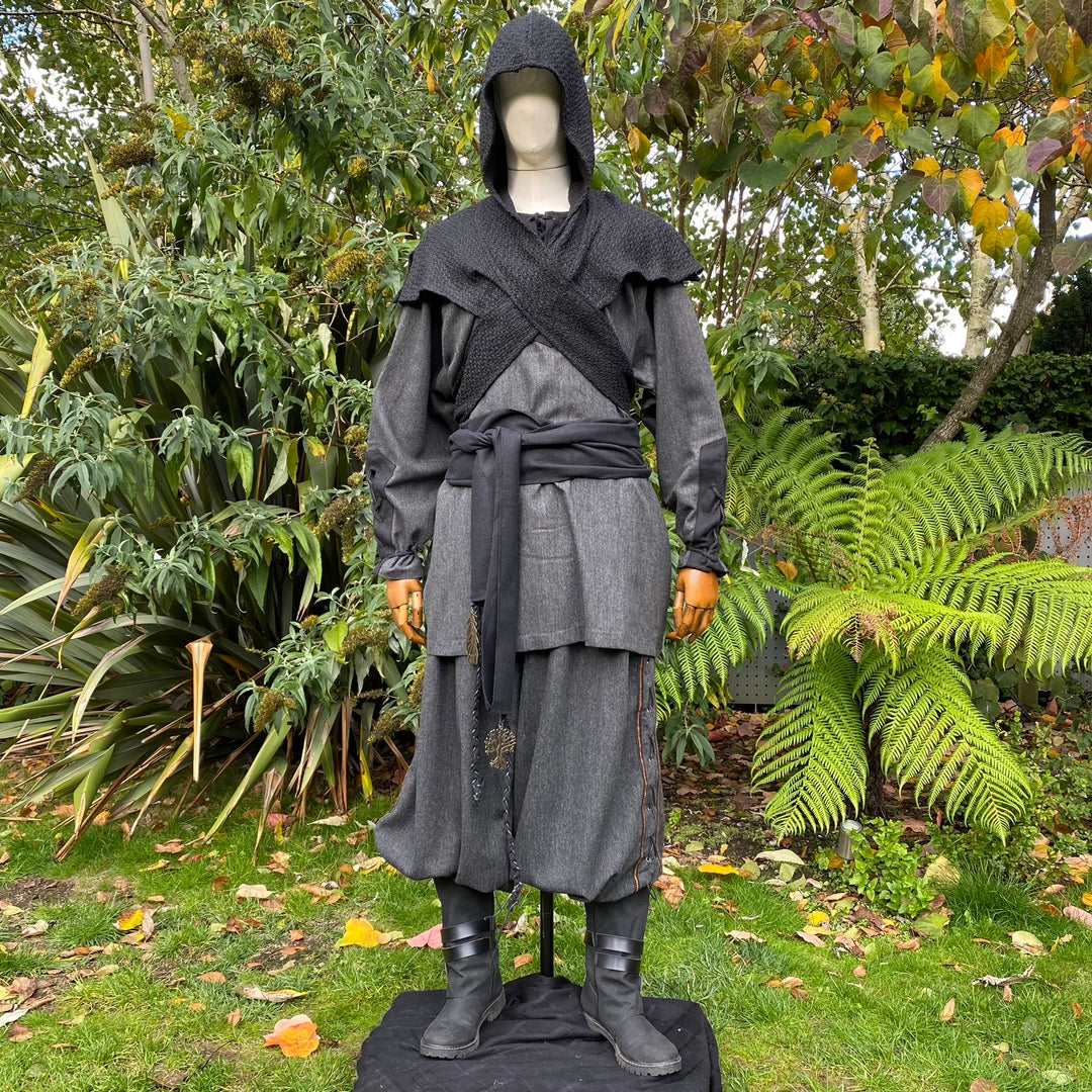 Medieval LARP outfit with hooded shirt and sash.