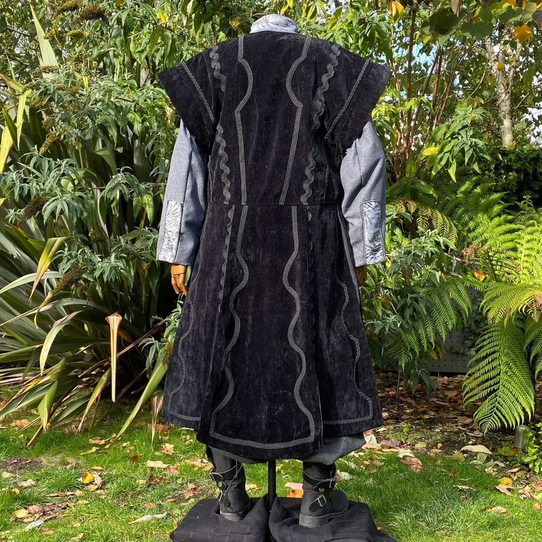 Back view of black suede-effect LARP waistcoat with long flowing panels for fantasy cosplay.