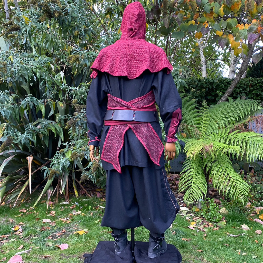 Rear view of red wool wrap-around LARP hood with medieval belt detail.