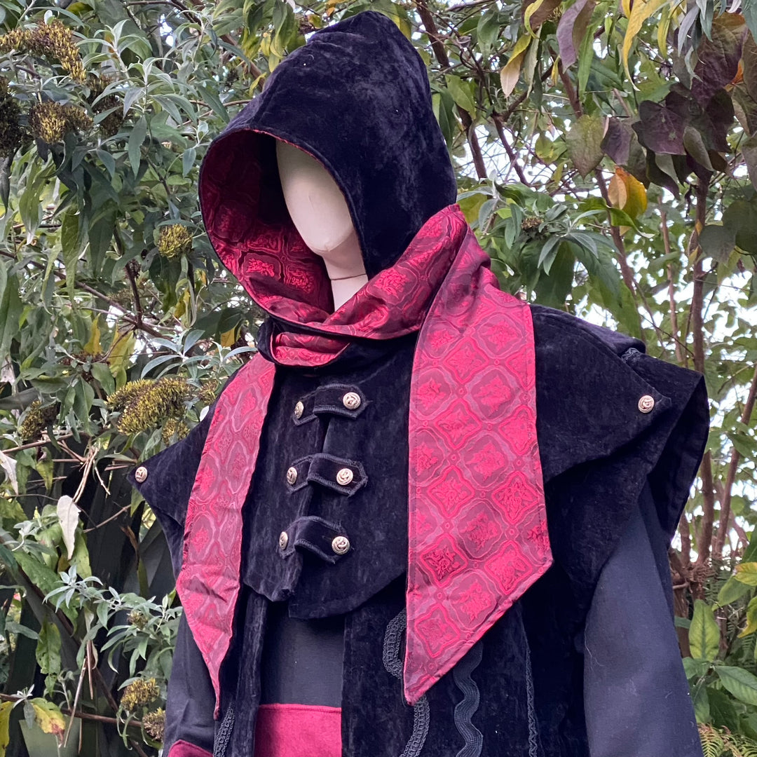 Blood Mage LARP outfit with ornate buttons, red pattern hood angled.