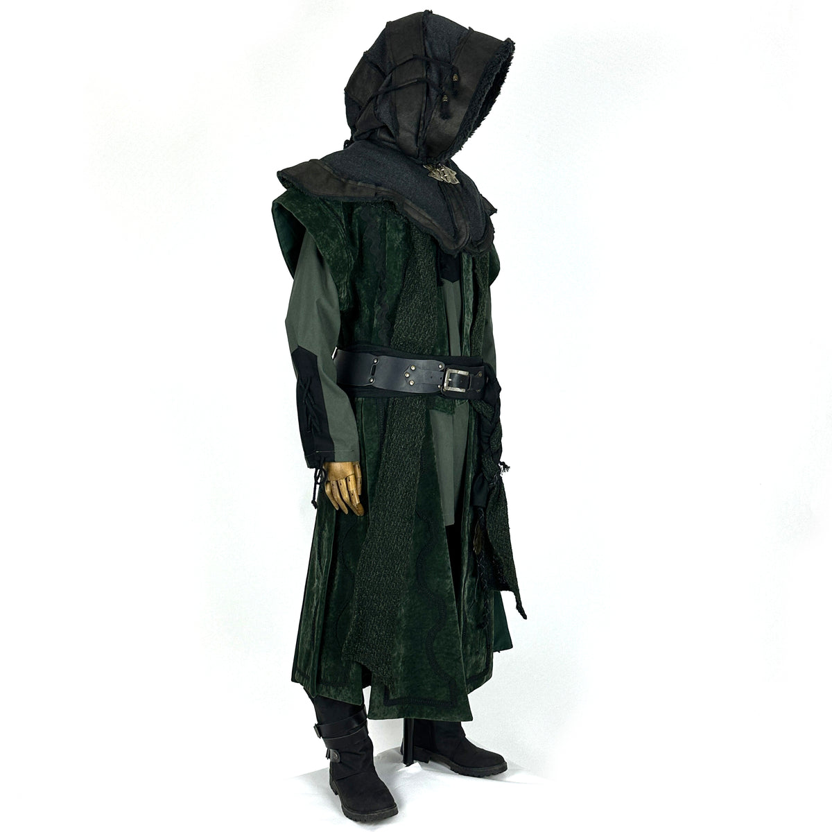 Side view of a medieval LARP costume, featuring a long green suede-effect waistcoat, leather and.