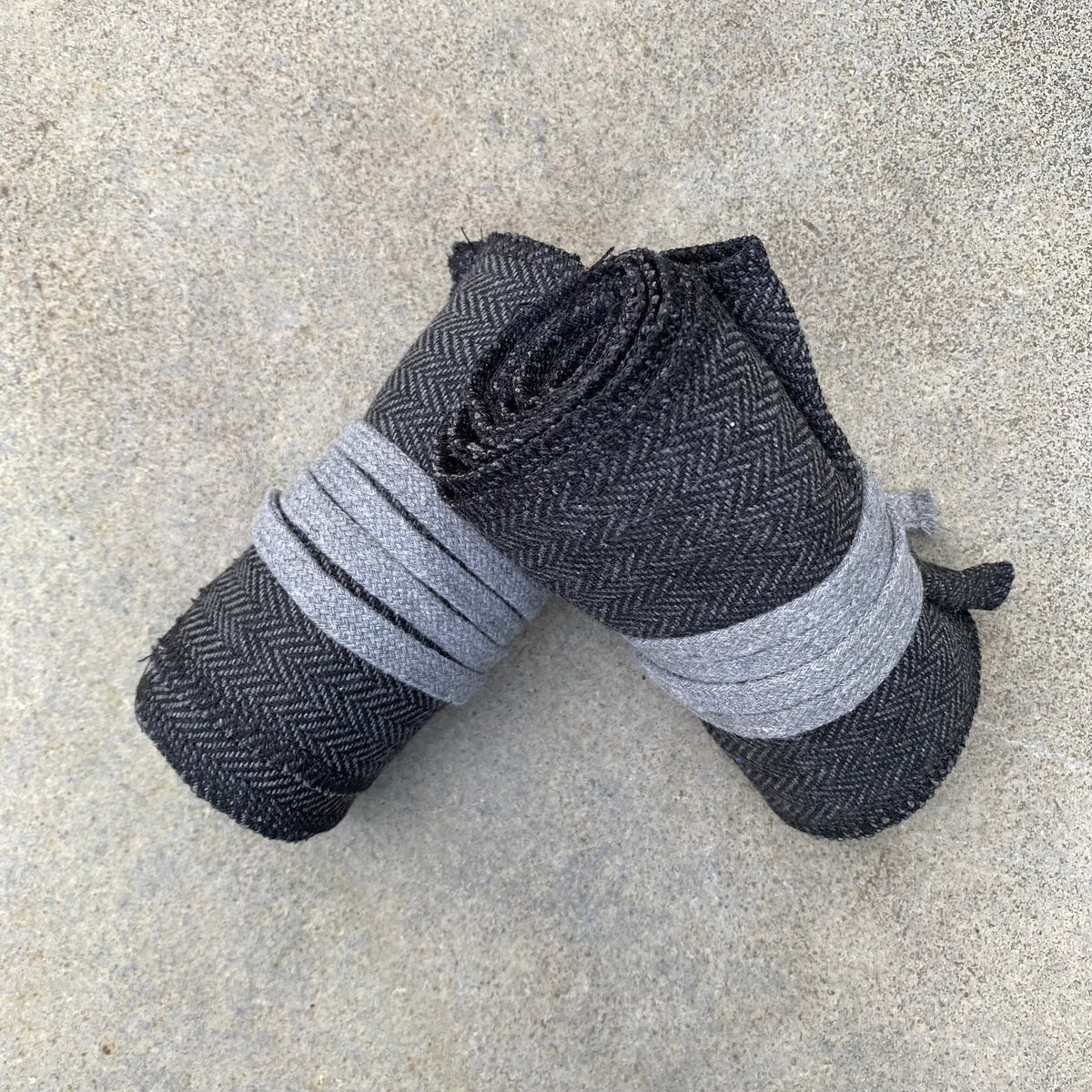 Rolled herringbone wrap set on concrete for LARP.