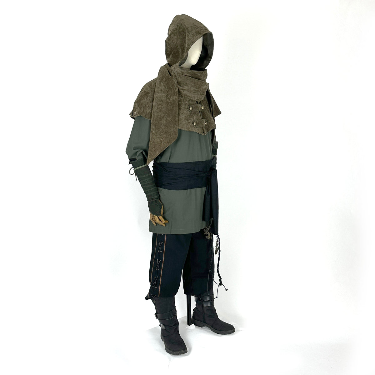 Medieval LARP outfit with green shirt, brown hood, black sash, side view.