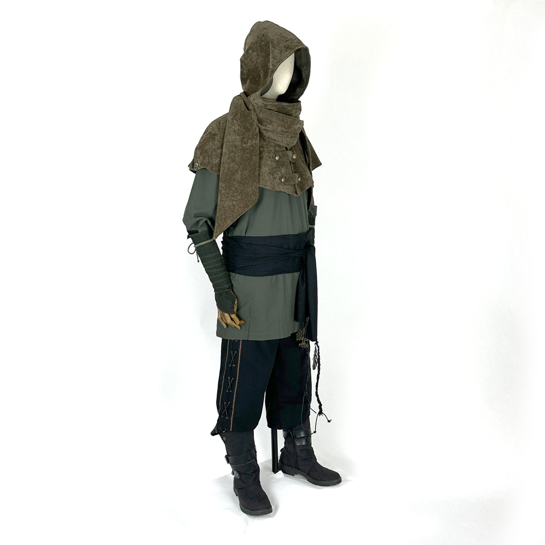 Medieval LARP outfit with green shirt, brown hood, black sash, side view.