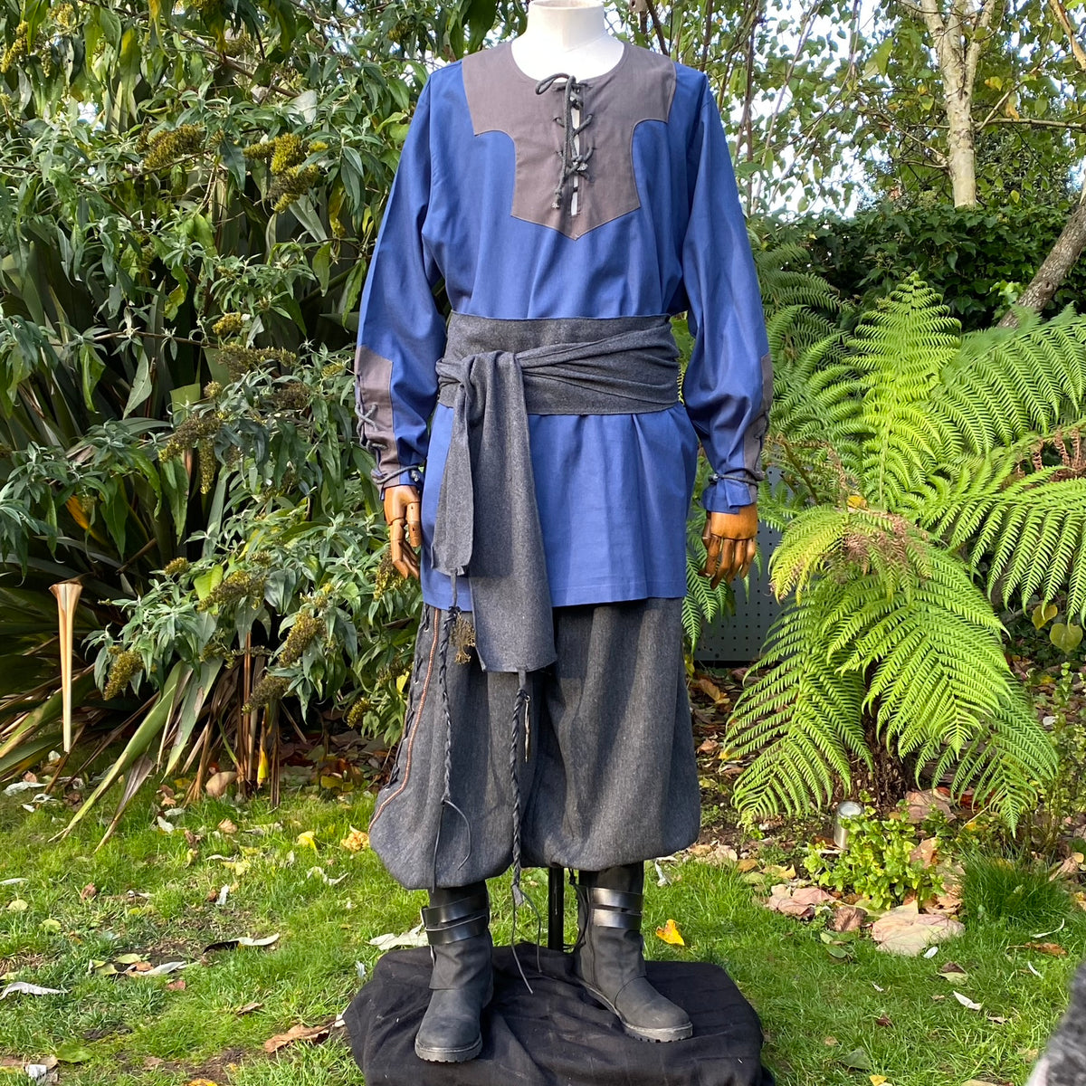 Medieval LARP outfit, blue-grey tunic and sash.