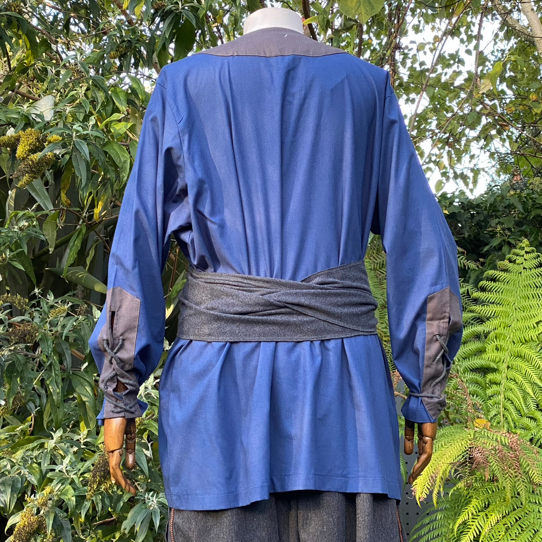 Back view LARP outfit with blue tunic, grey sash.