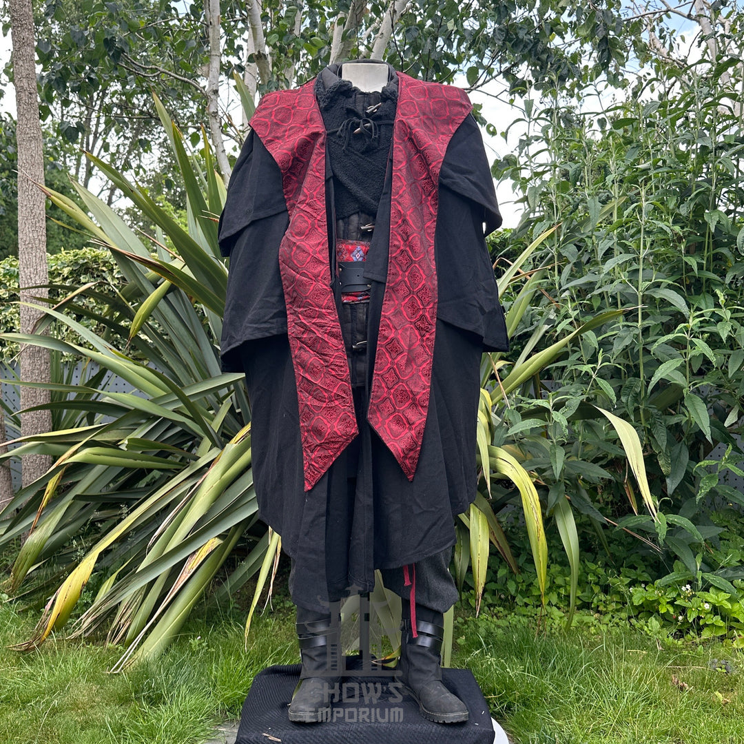 Full-length view of black and red layered LARP cloak, authentic medieval fantasy cosplay costume.