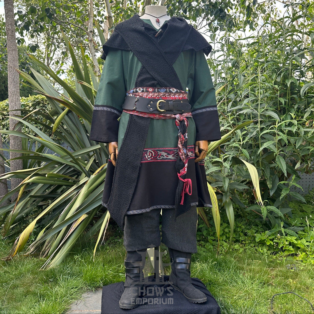 LARP medieval outfit with green tunic and patterned sash.