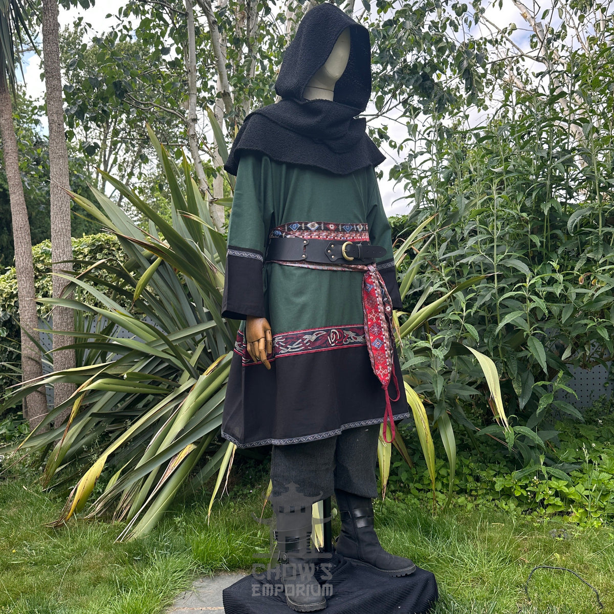 LARP medieval outfit with green tunic, black hood, trousers, and sash.