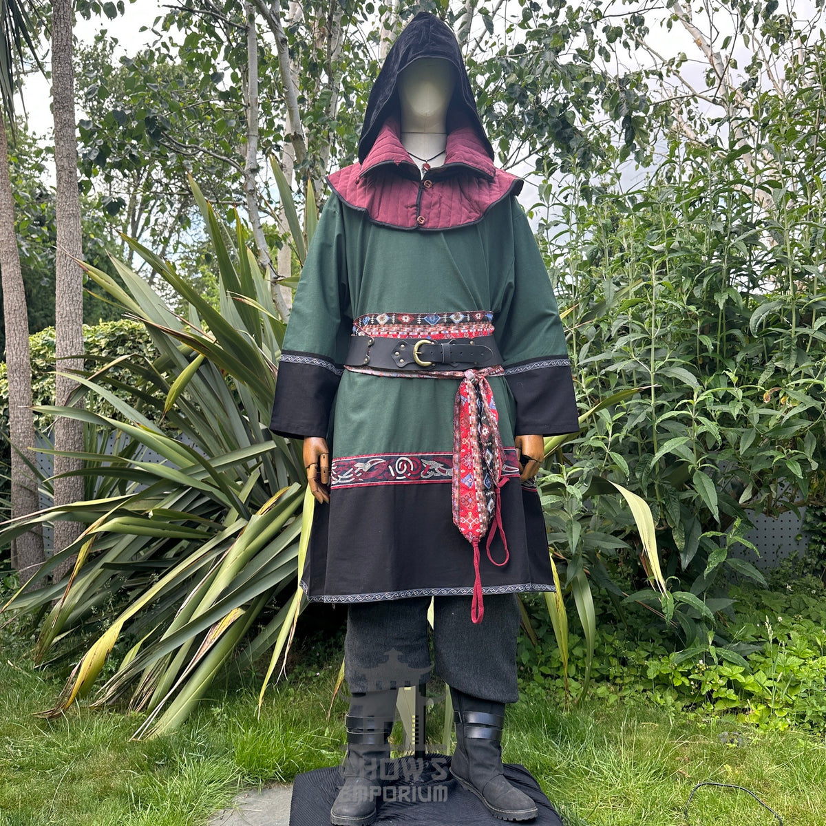 Green and black LARP tunic, trousers, and sash with medieval style.