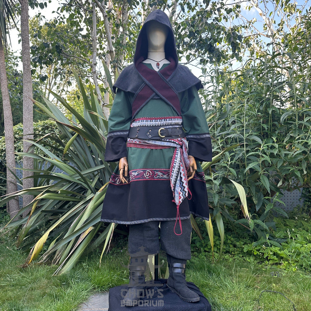 Medieval LARP outfit front view, featuring a green and black Viking tunic, reversible hood.