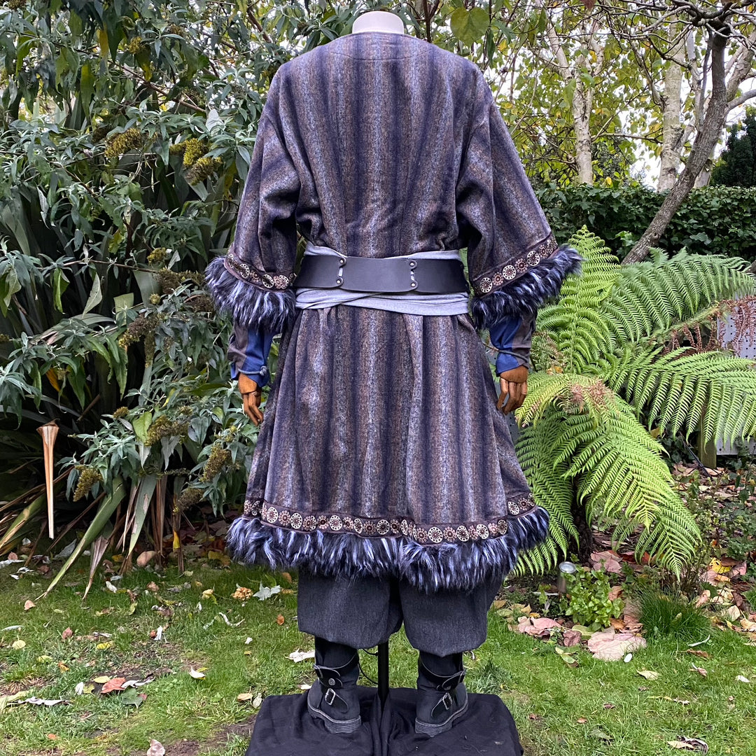 Back view of a dark blue medieval LARP cloak with fur trim, belt, and embroidered details.