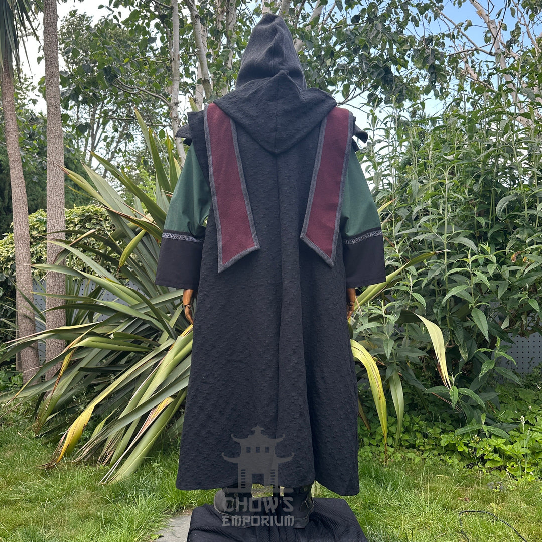 Medieval LARP costume back view featuring sleeveless robe, tunic, hood, pants, belt and sash.