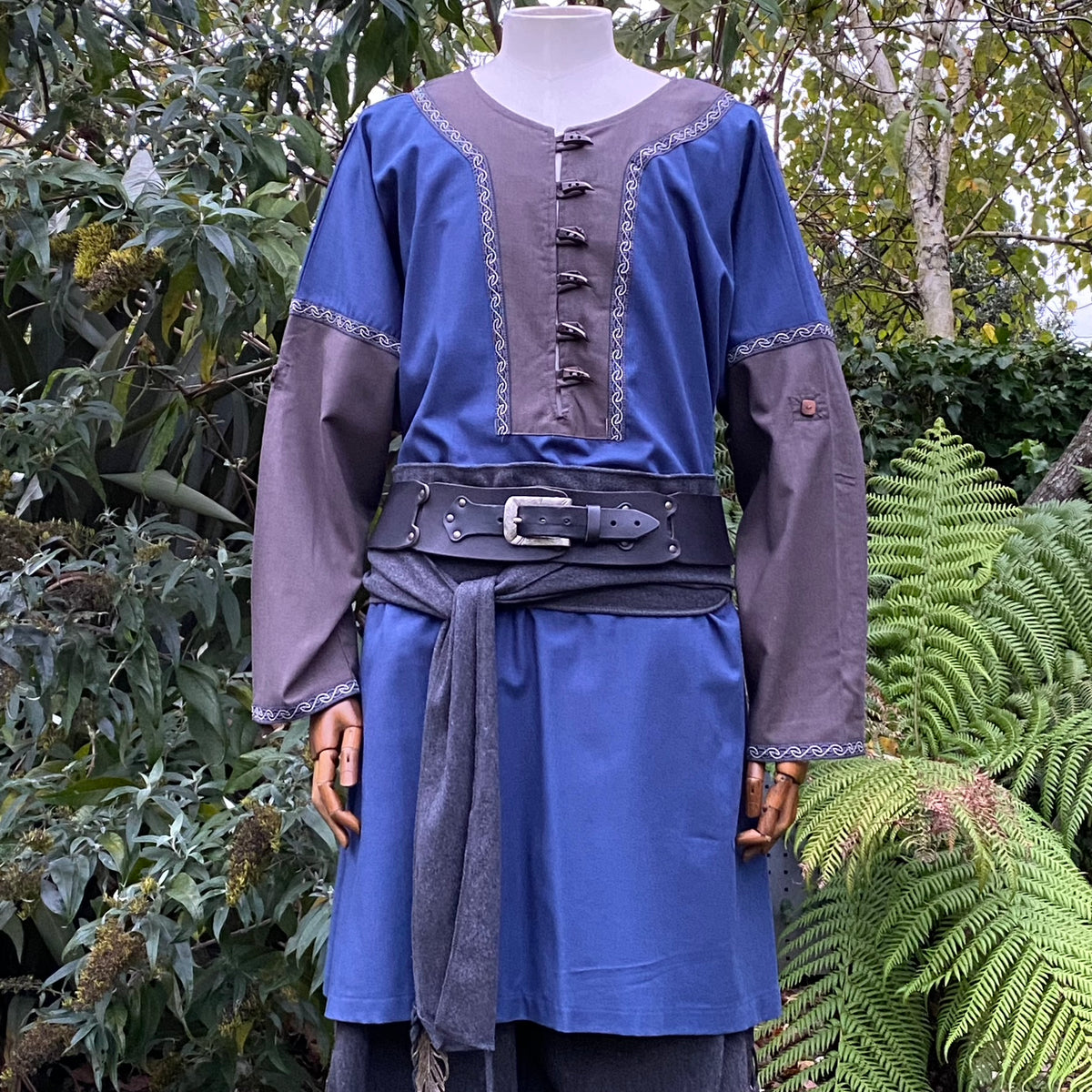 Blue suede effect LARP waistcoat, tunic, and sash with black belt.