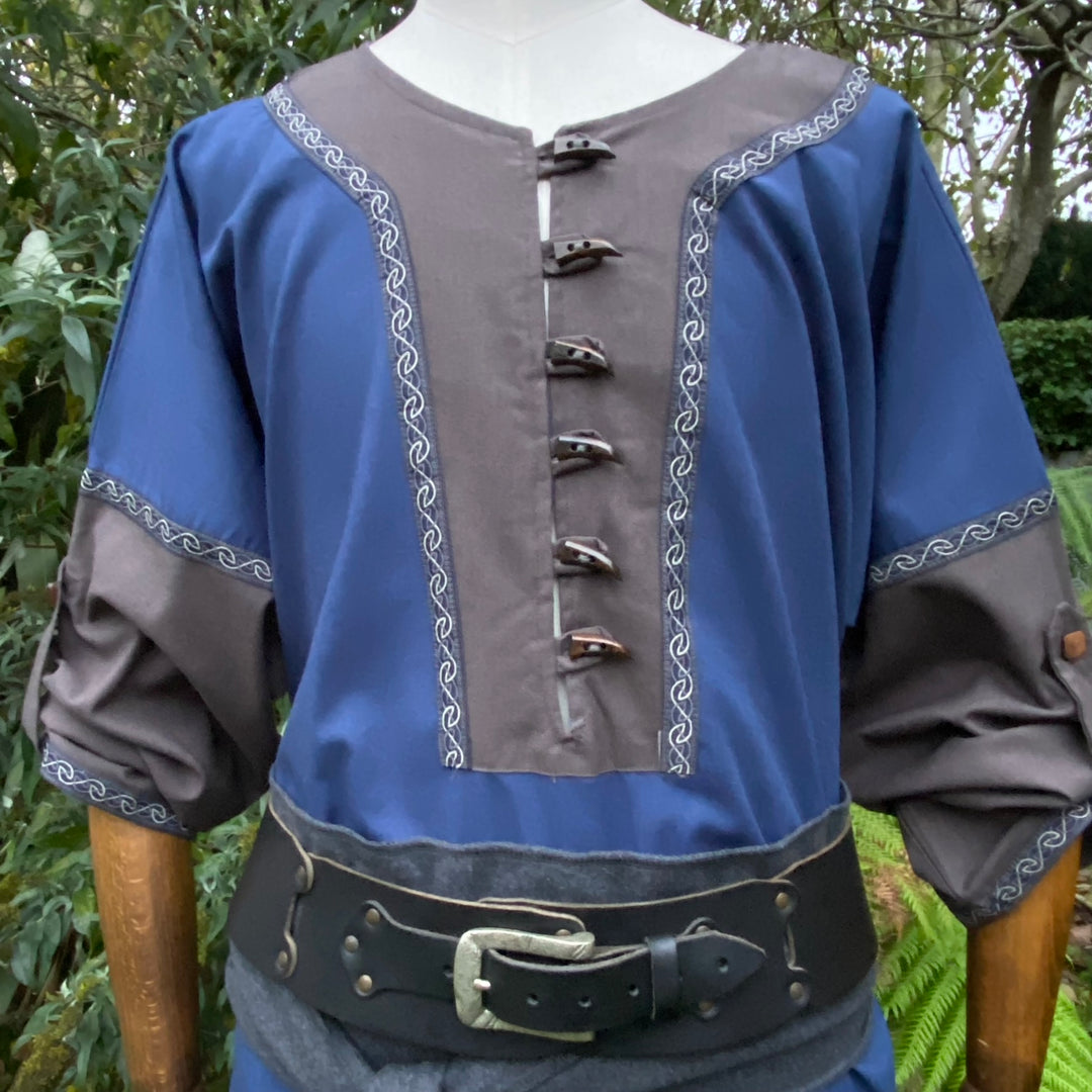Blue and grey LARP tunic with sash, front view, detailed trim stitching.