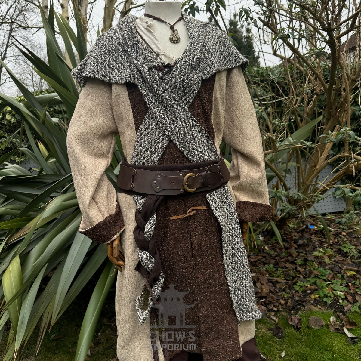Brown, beige, and black medieval wool scarf hood draped over shoulders.