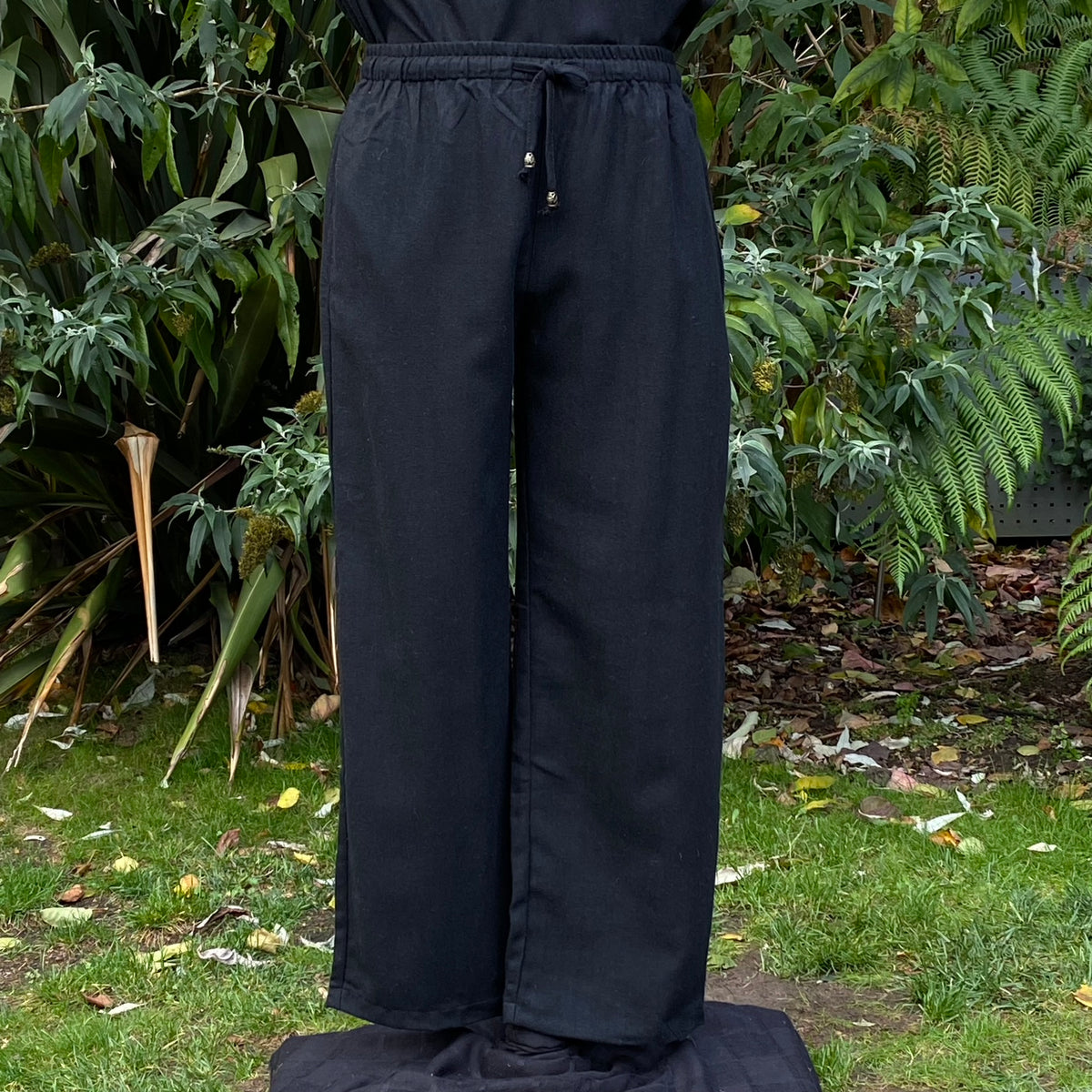 handmade black wool roleplay pants with straight cut.