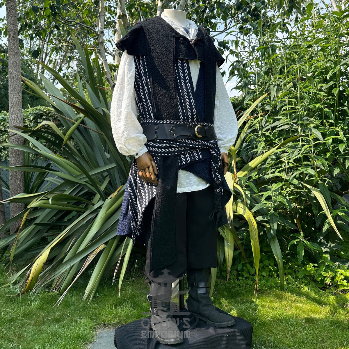 LARP medieval outfit with layered waistcoat, garden background view.