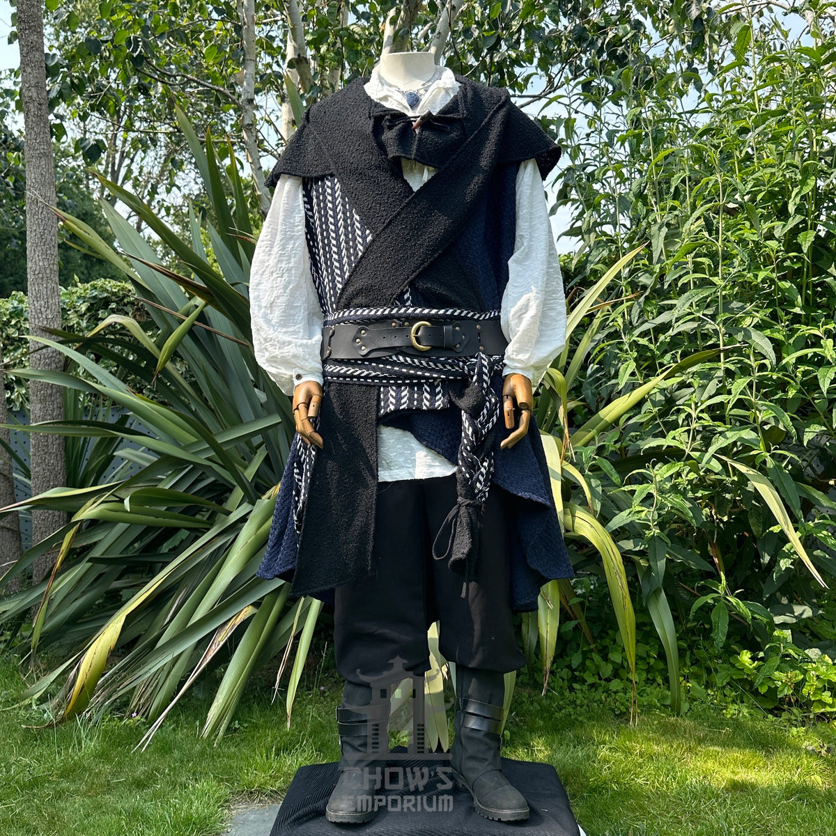 Medieval LARP explorer attire outdoors, black waistcoat with white shirt.
