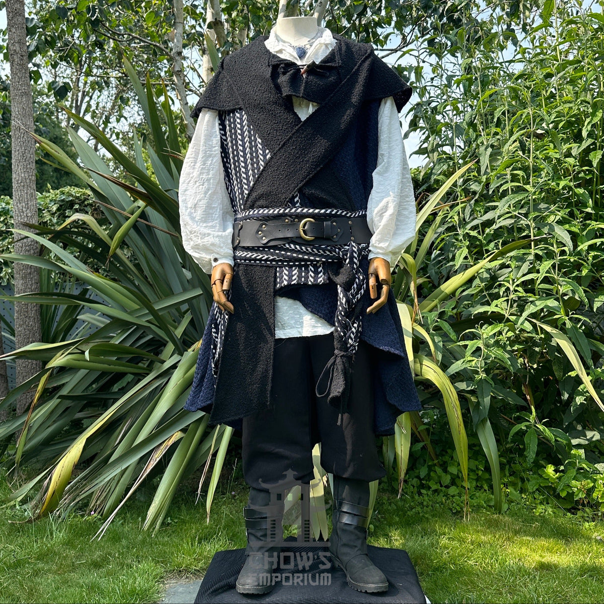 Pirate LARP set with black waistcoat, white shirt, sash, and trousers.