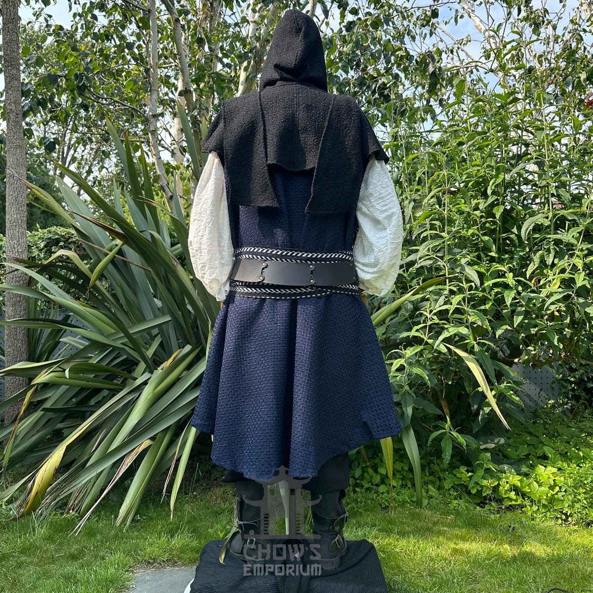 Back view of LARP costume, featuring a black hood and detailed leather belt.