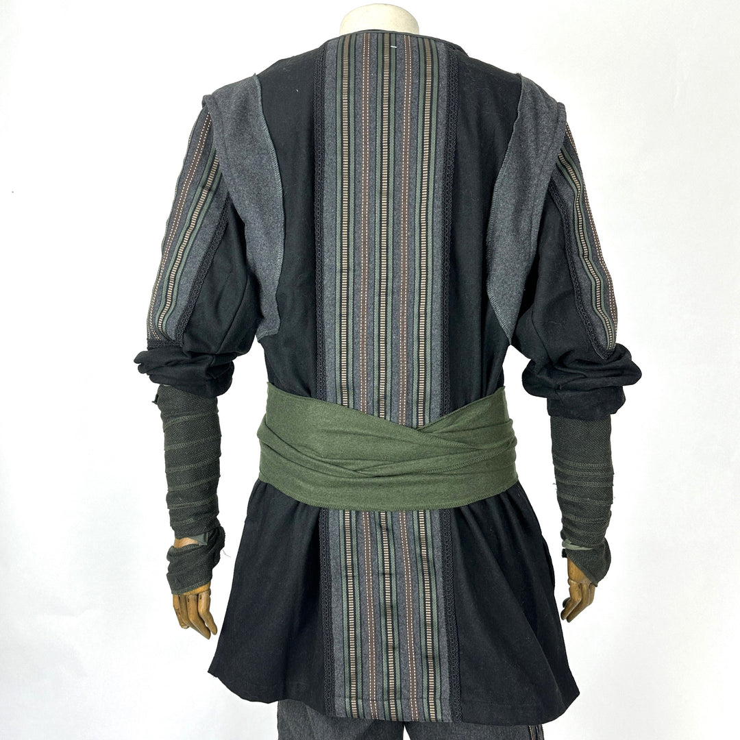 Back angle of LARP jacket with striped panels and green waist wrap.