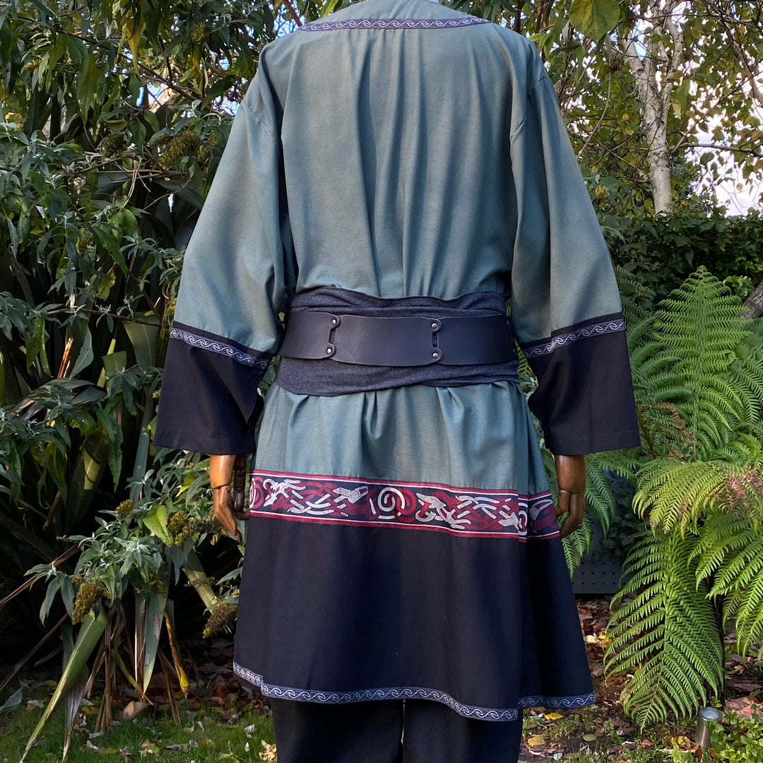 Back view of green medieval tunic with black accents for LARP.