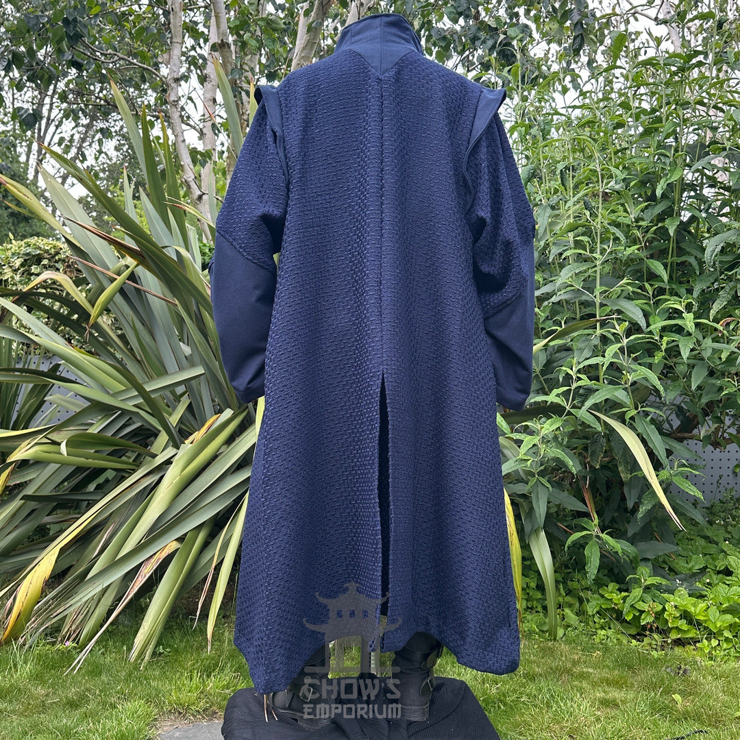 Medieval LARP costume back view featuring a robe, waistcoat, shirt, pants, sash and necklace.