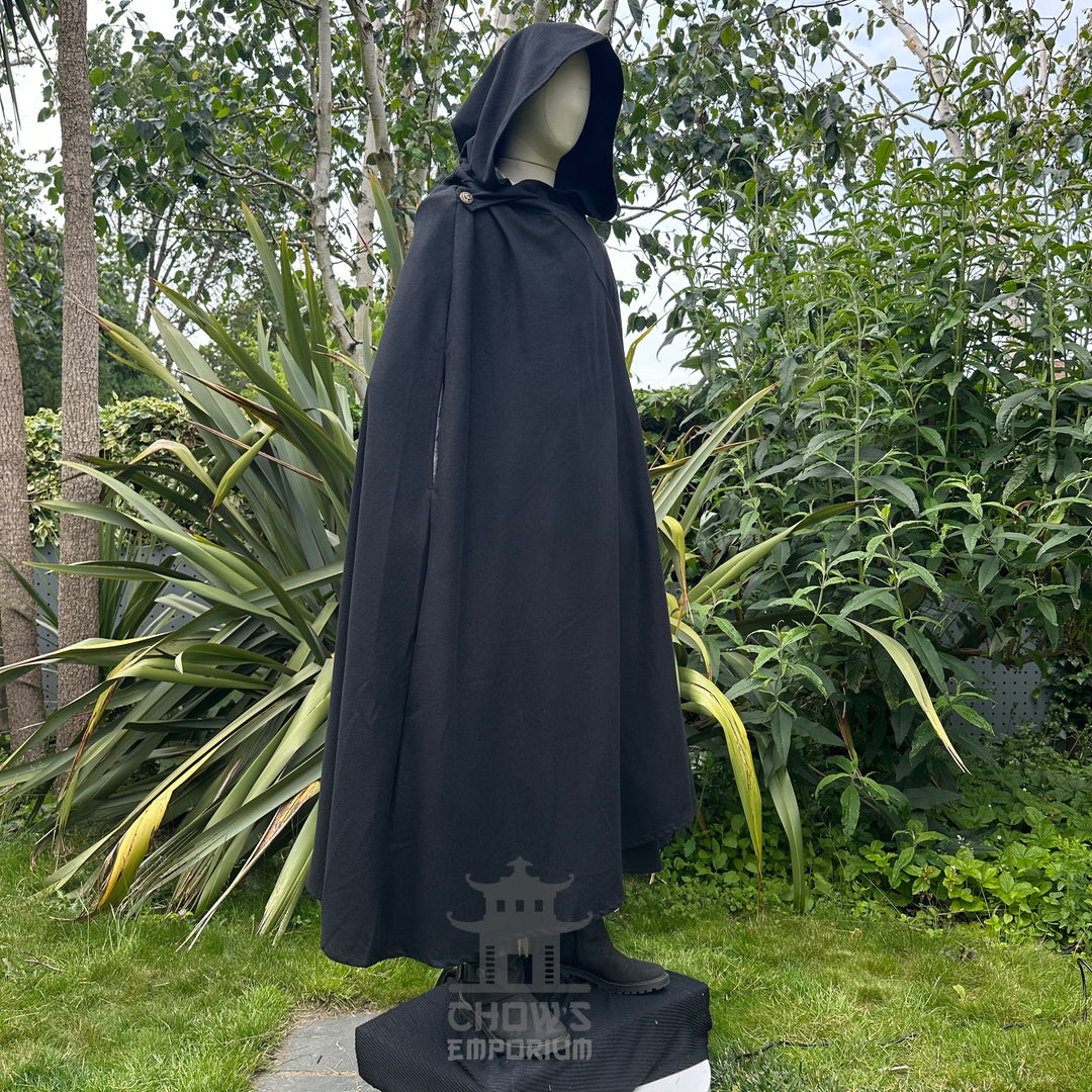 Angled view of hooded black wool medieval cloak, fantasy cosplay costume for LARP and.