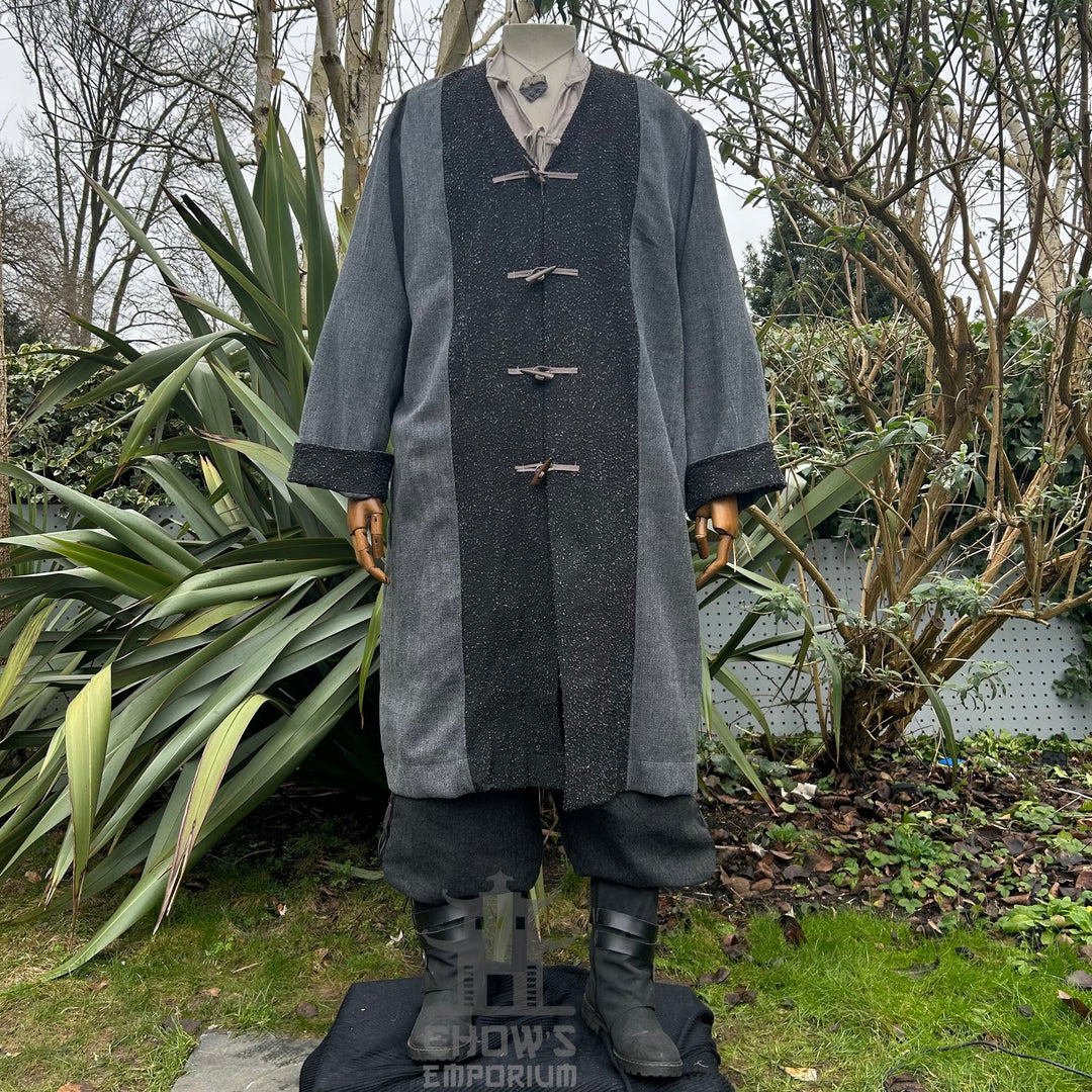 LARP medieval set: grey jacket, black trousers, beige shirt, black sash.