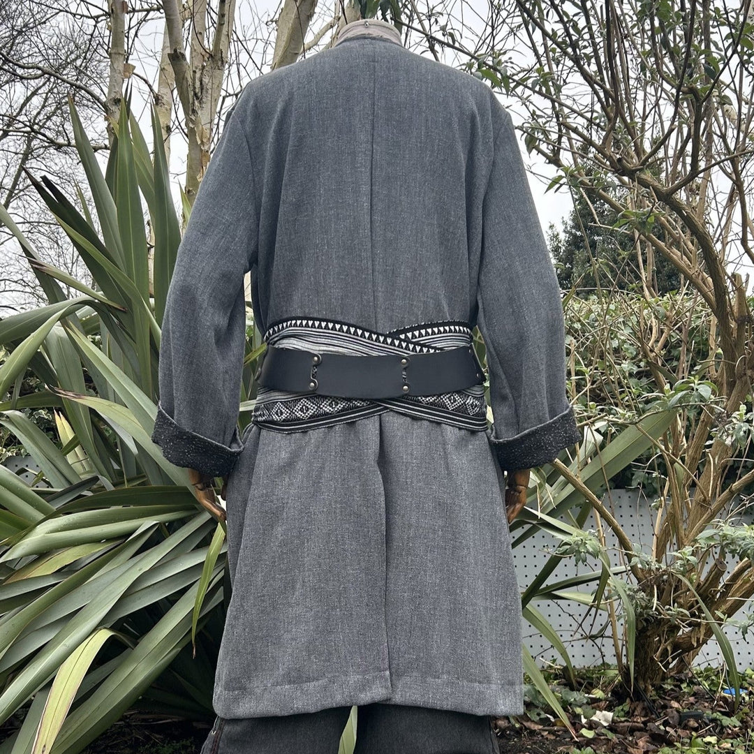 Back angle of grey-black LARP pirate coat with decorative belt.