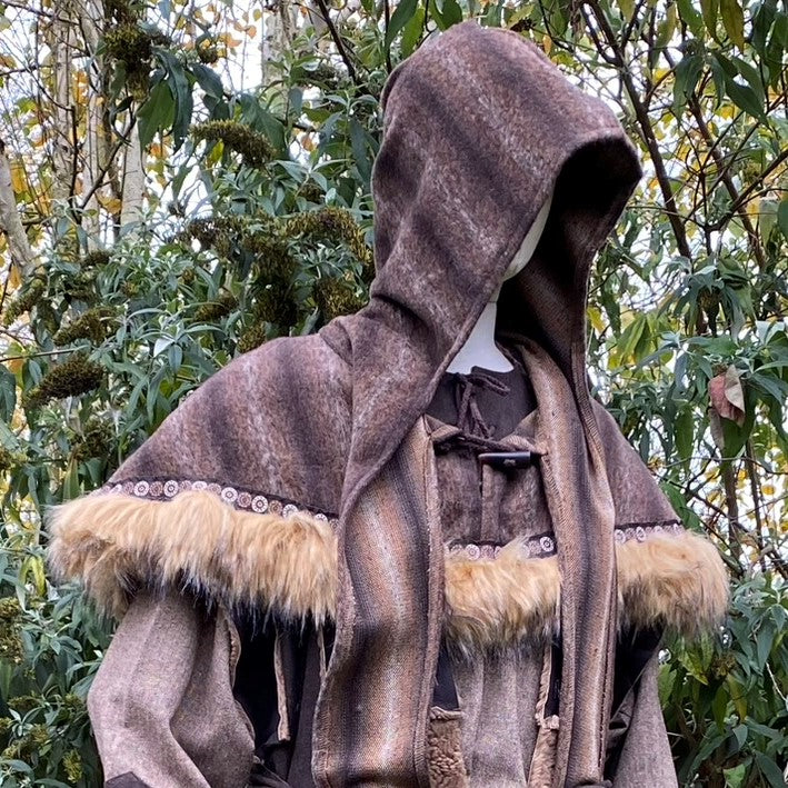 Brown wool LARP tunic with hood, fur trim, front view, autumn background.