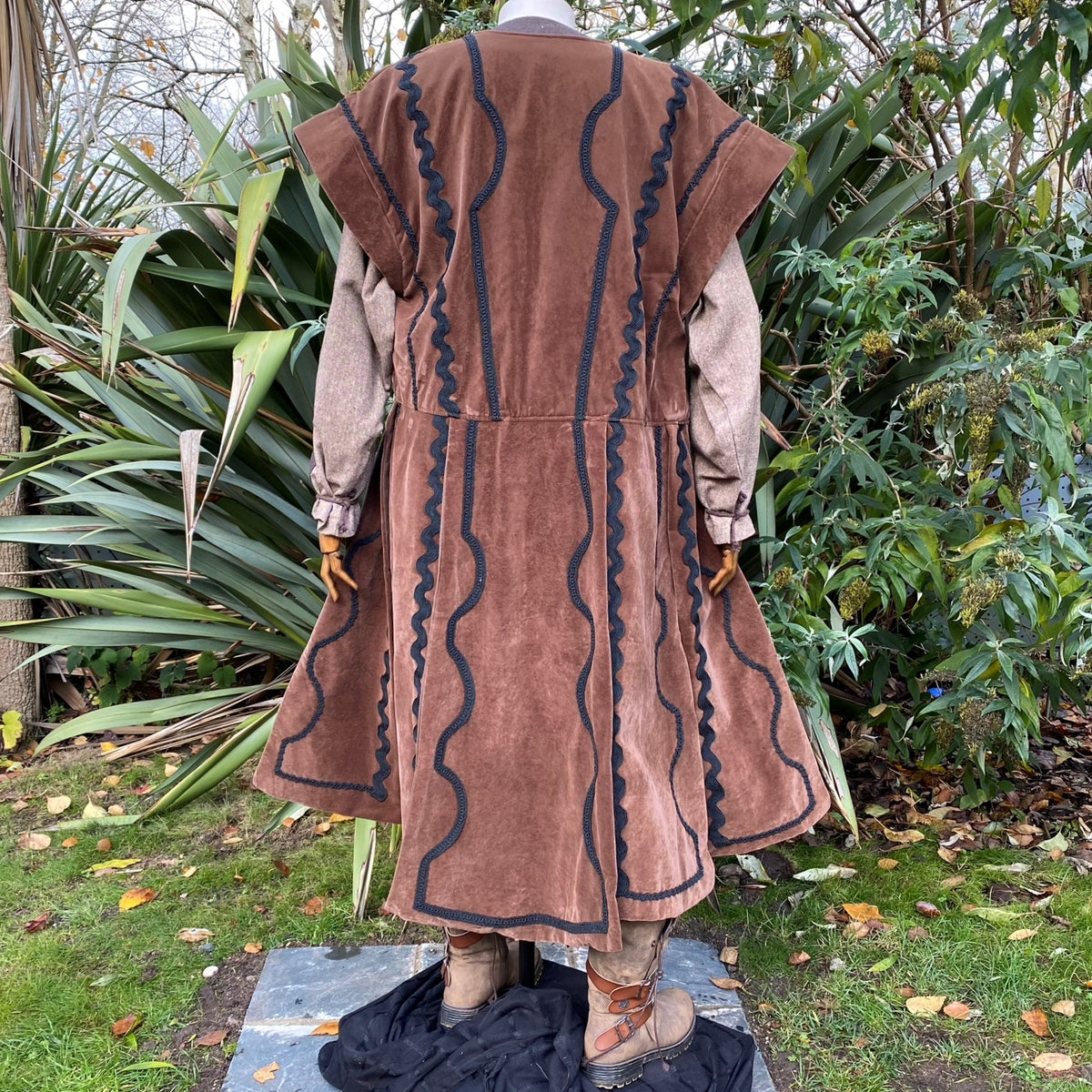 Back view of LARP waistcoat, brown suede effect with black braiding.