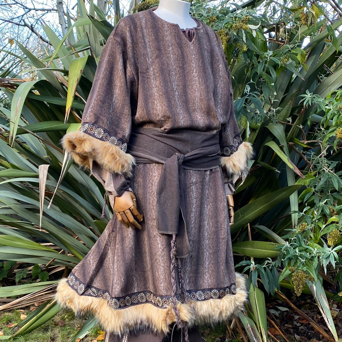 Brown medieval LARP tunic, hood, belt, and sash with fur trim, side view.