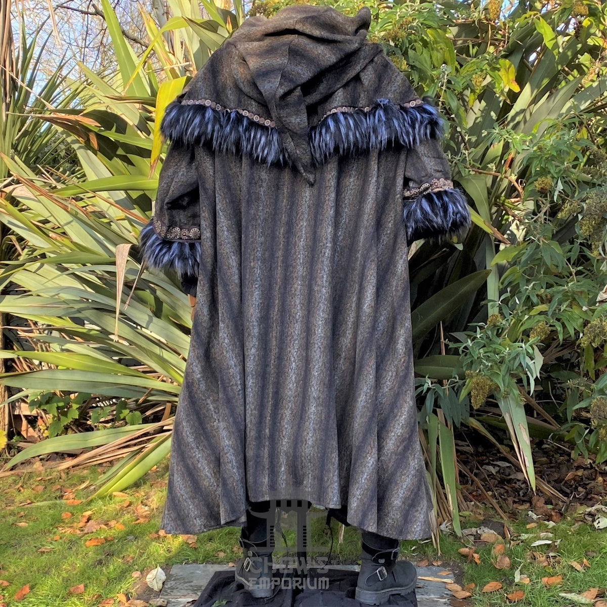 Dark hooded cloak and tunic with blue trim, back view, for LARP or medieval events.