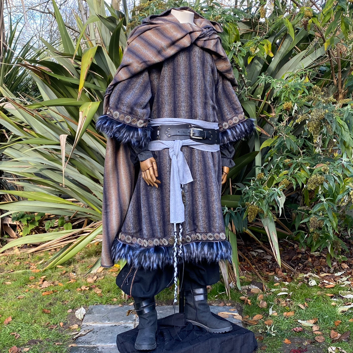 LARP medieval outfit with blue striped cloak, tunic, hood, and sash.