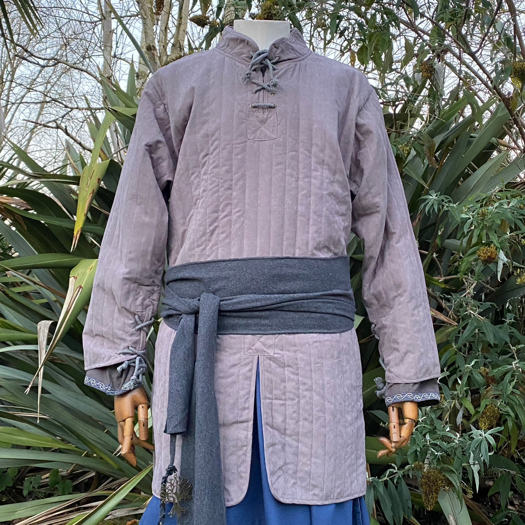 Grey medieval gambeson with sash.