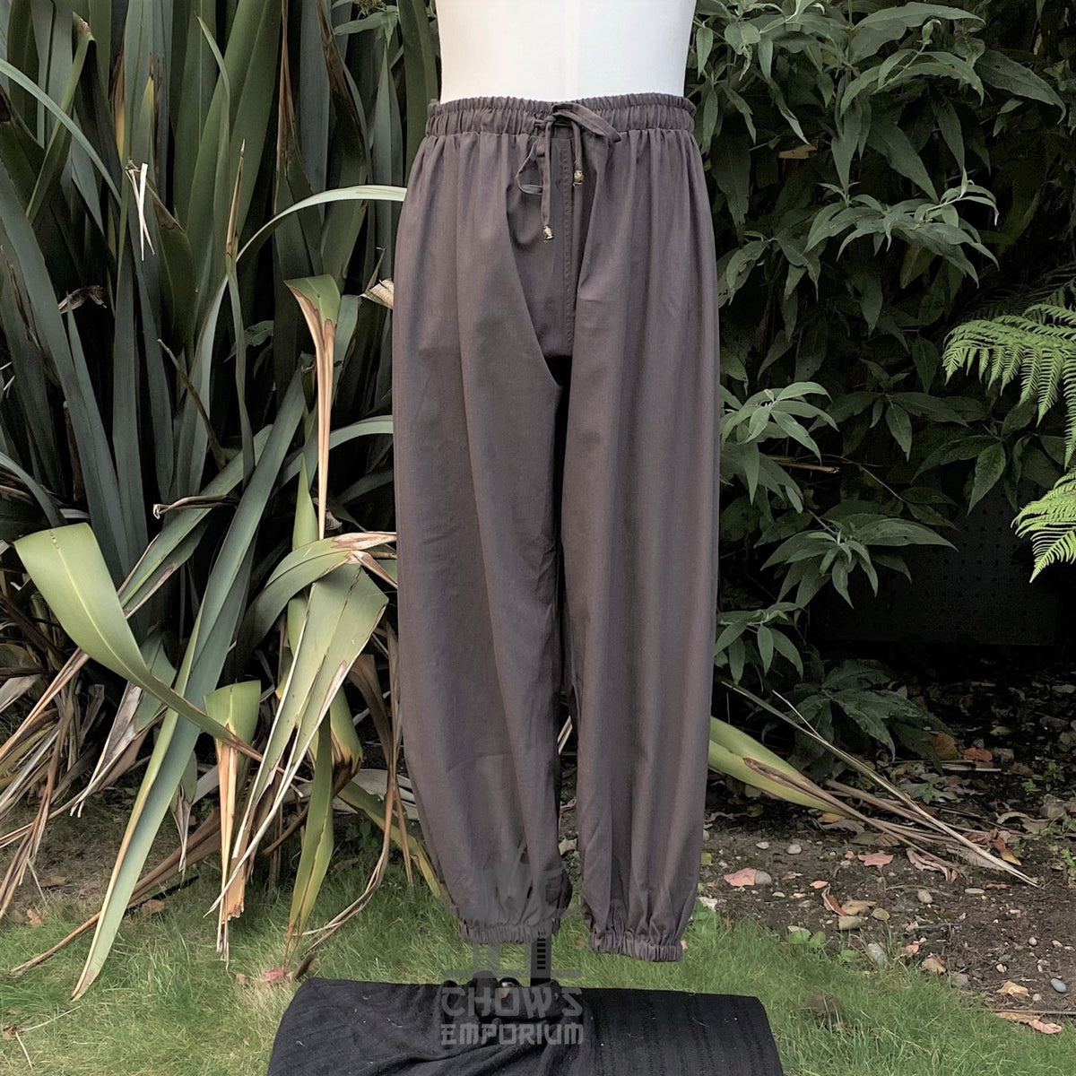 Front view of grey cotton medieval hero pants with elasticated waist and ankles for LARP or.