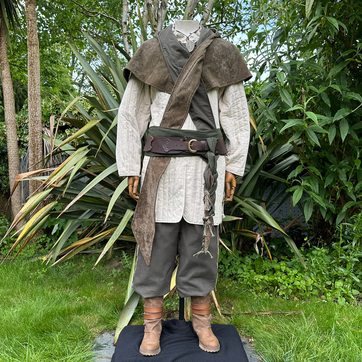 White cotton gambeson for LARP, front view with brown accents.