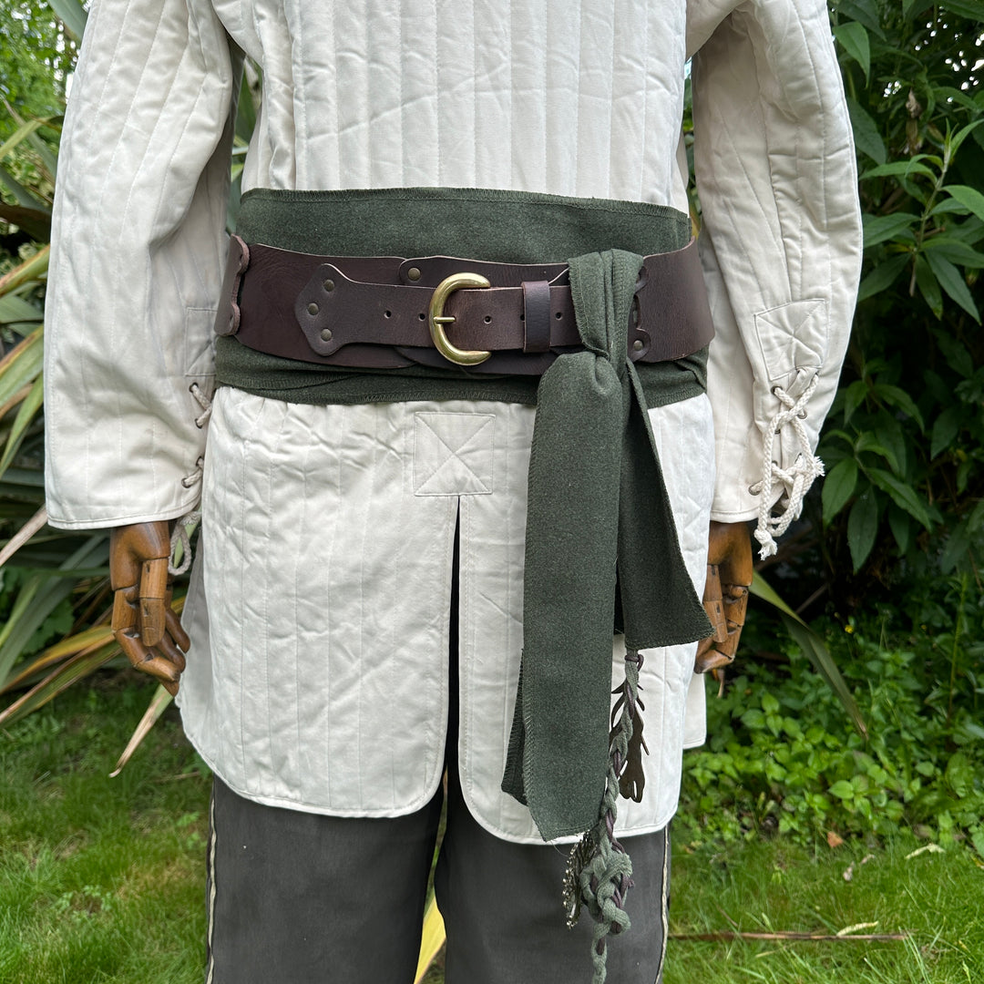White cotton gambeson for LARP, medieval style, waist-close angle.