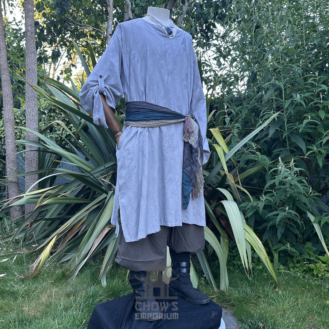 Grey textured cotton medieval tunic, front view.
