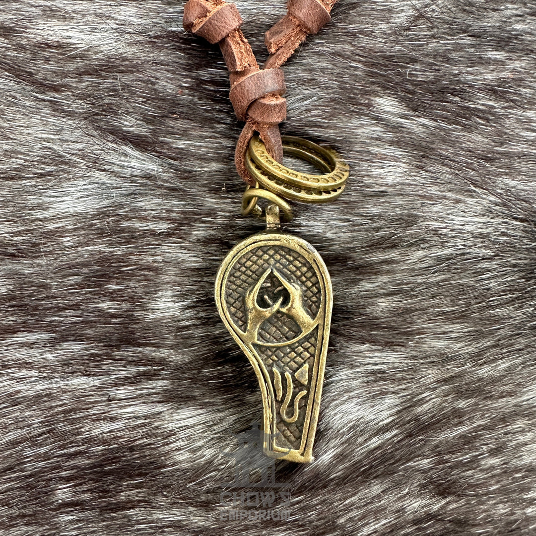 Bronze whistle necklace with intricate design on leather cord for LARP events.