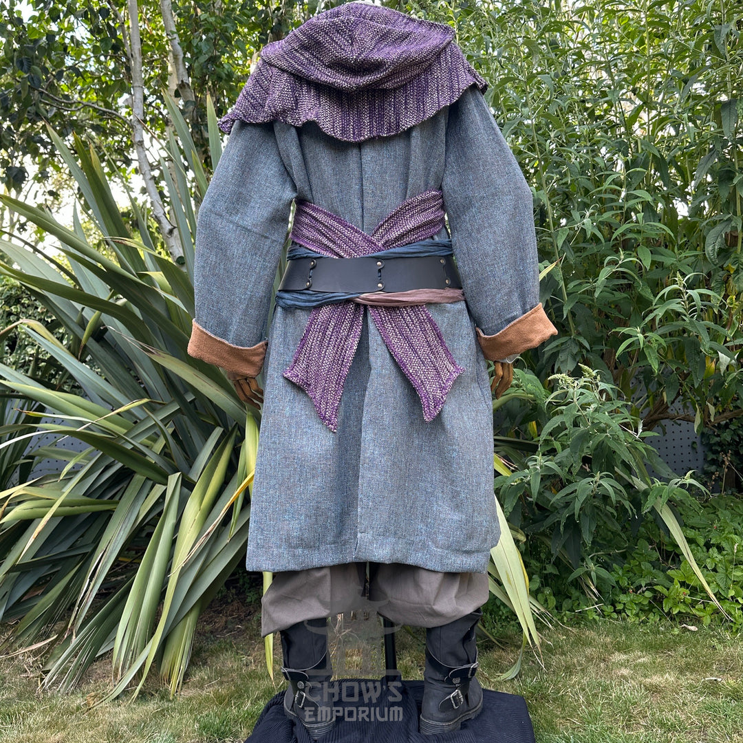 Rear view of medieval LARP set with blue robe, purple sash, and hood.