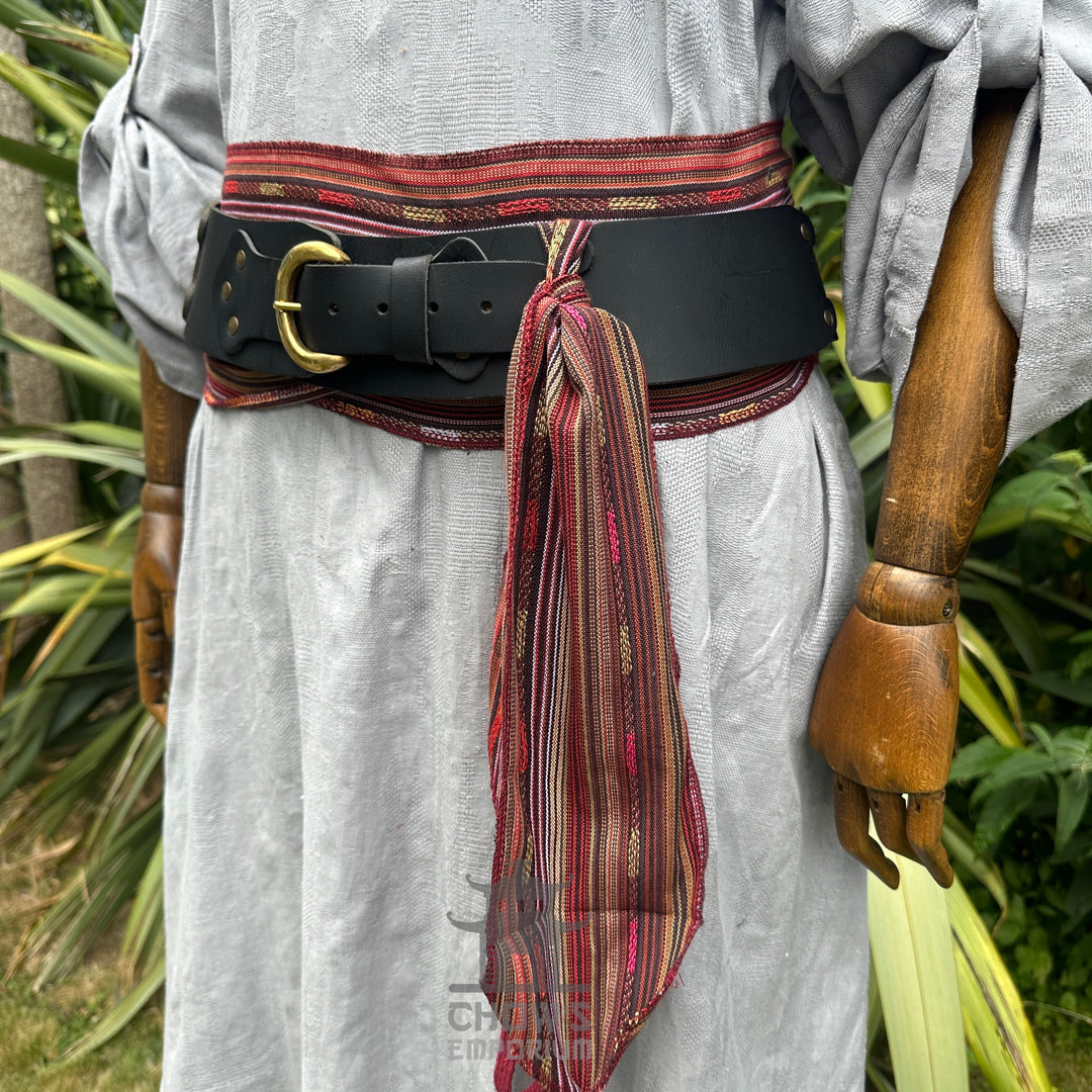Red autumnal stripe LARP belt and sash, buffalo leather close-up view.