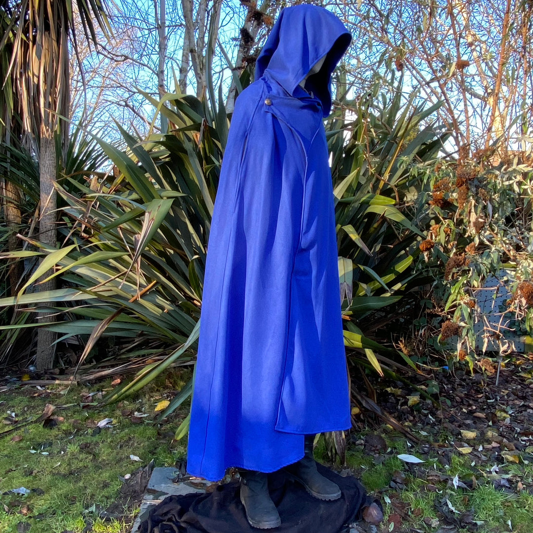 The Four Way LARP Cloak in Blue is a Versatile Cape with Hood. The Medieval Cloak is Water.