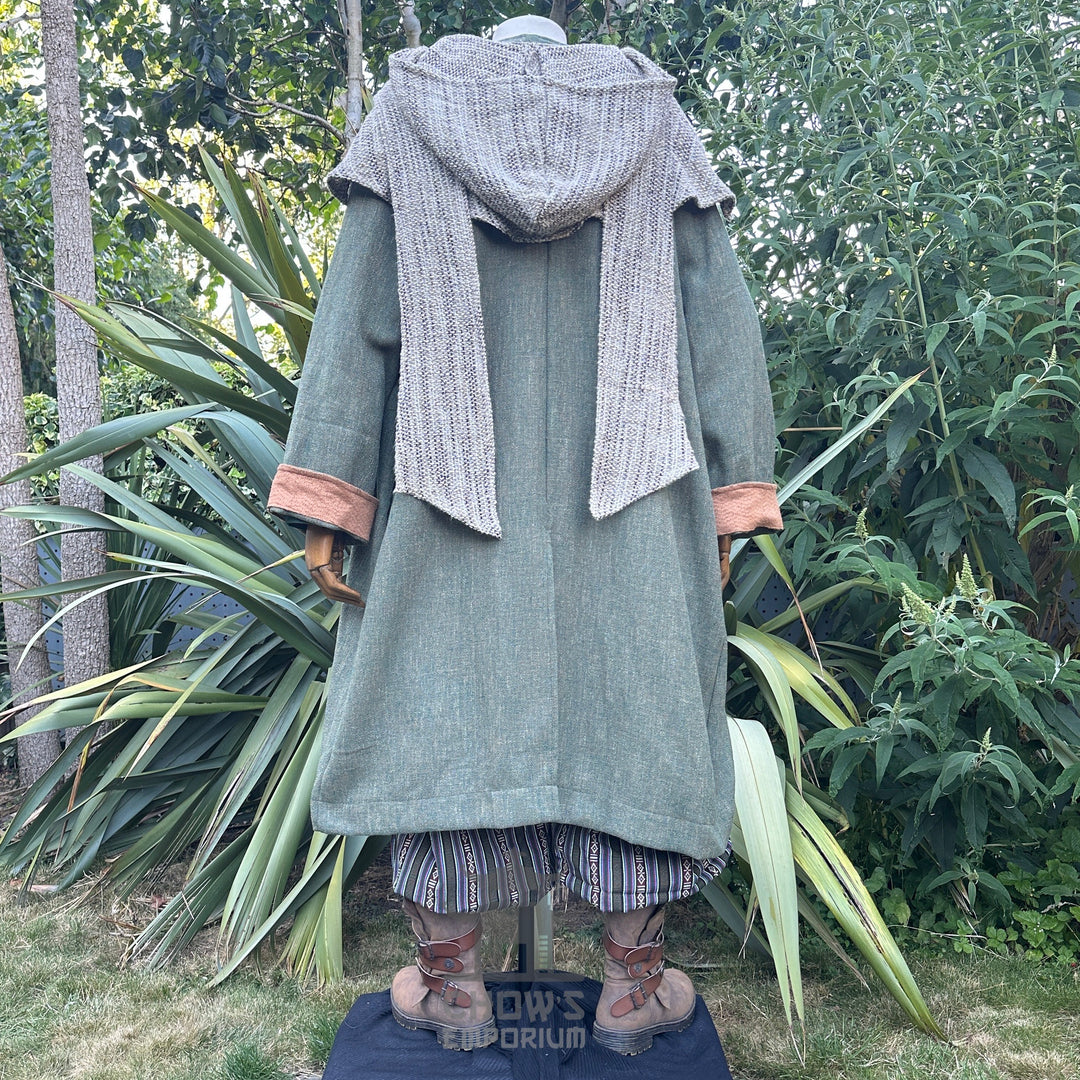 Green and brown pirate LARP coat styled over medieval tunic and belt, fantasy cosplay costume.