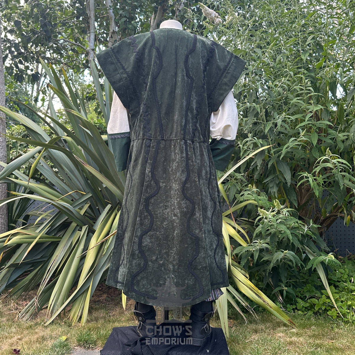 Emerald velvet medieval waistcoat, back view, over cream tunic for LARP.