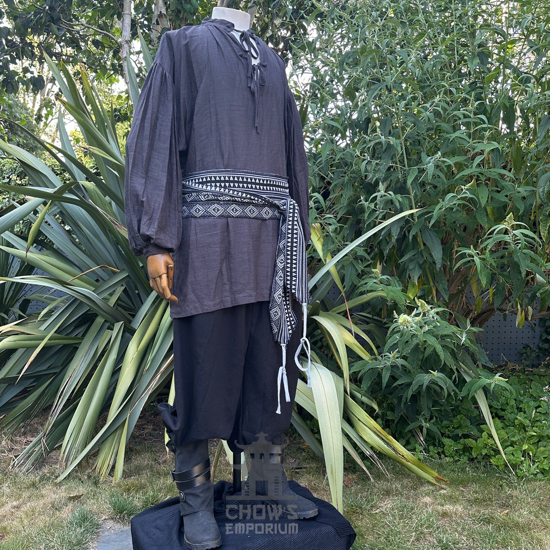 LARP Necromancer Costume: black shirt, trousers, sash, waistcoat, belt.