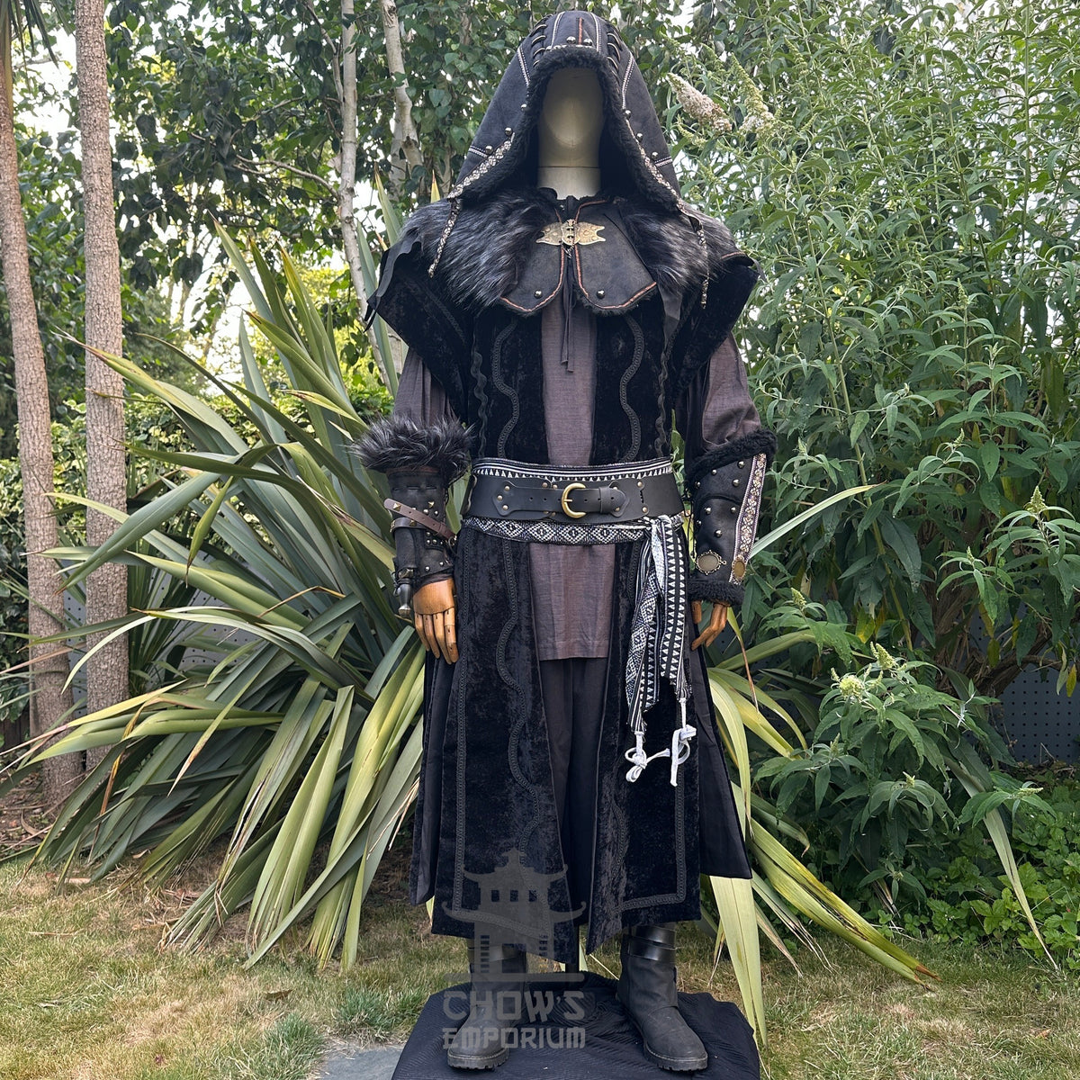 Medieval LARP costume front view featuring waistcoat, hood, vambraces, shirt, trousers, belt.
